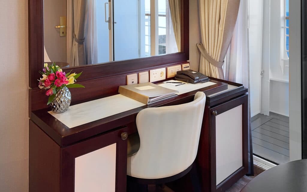 The writing desk in an Azamara Pursuit Veranda Stateroom.