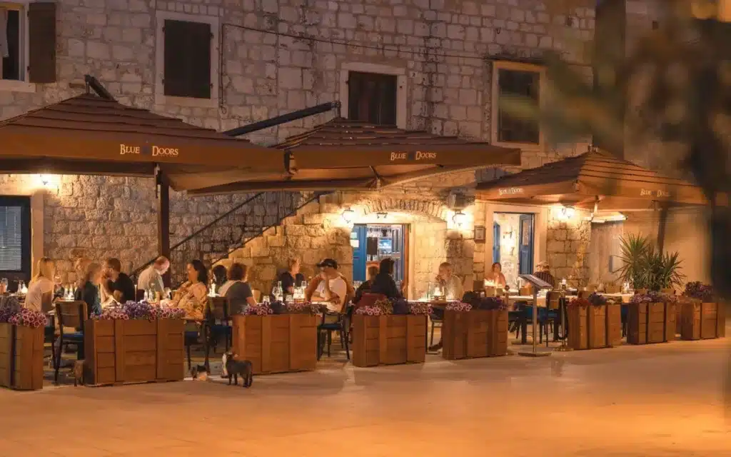 The alfresco dining area of Blue Doors restaurant in Hvar, Croatia.
