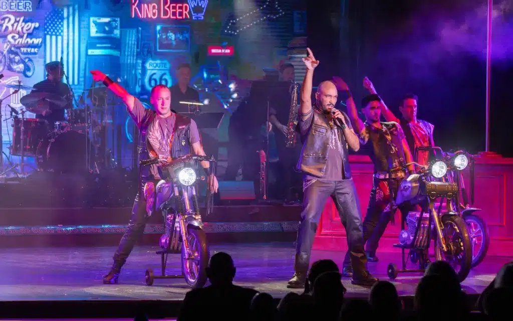 Performers on stage aboard a Crystal cruise ship.