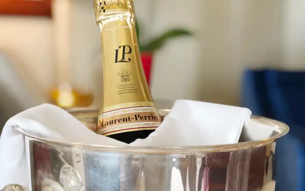 A bottle of Laurent-Perrier champagne.