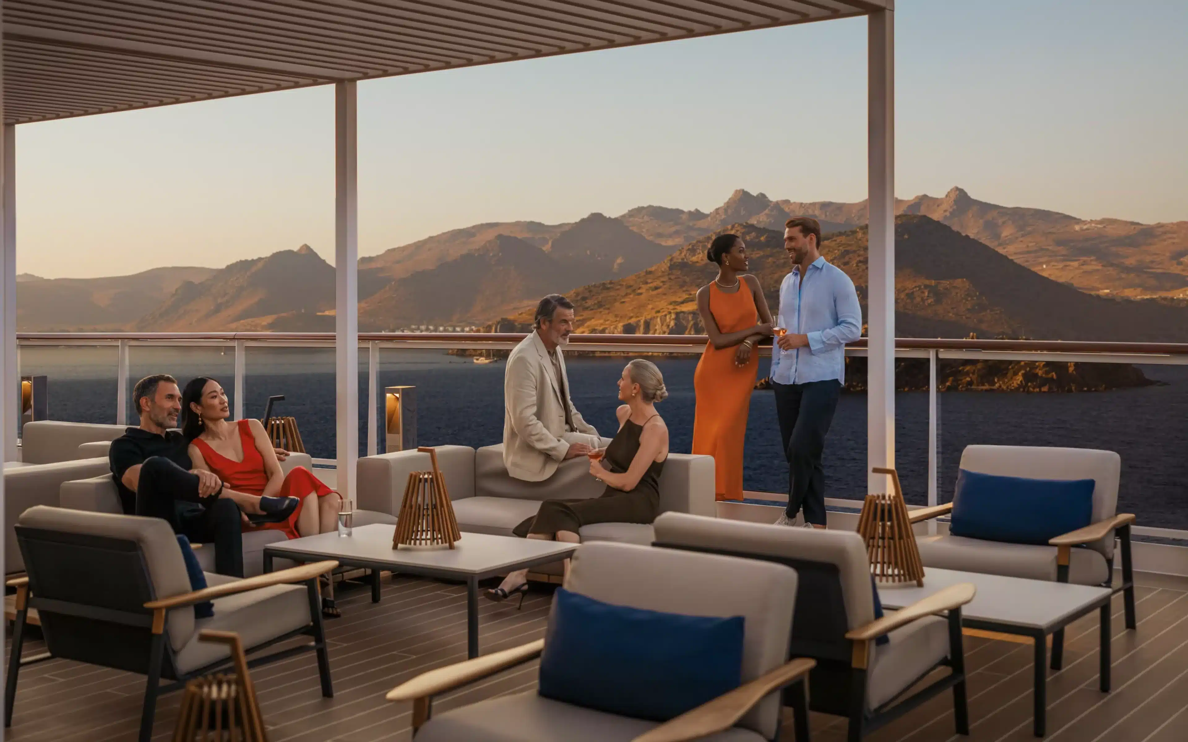 Male and female passengers gather in the SKy Bar on Explora I.