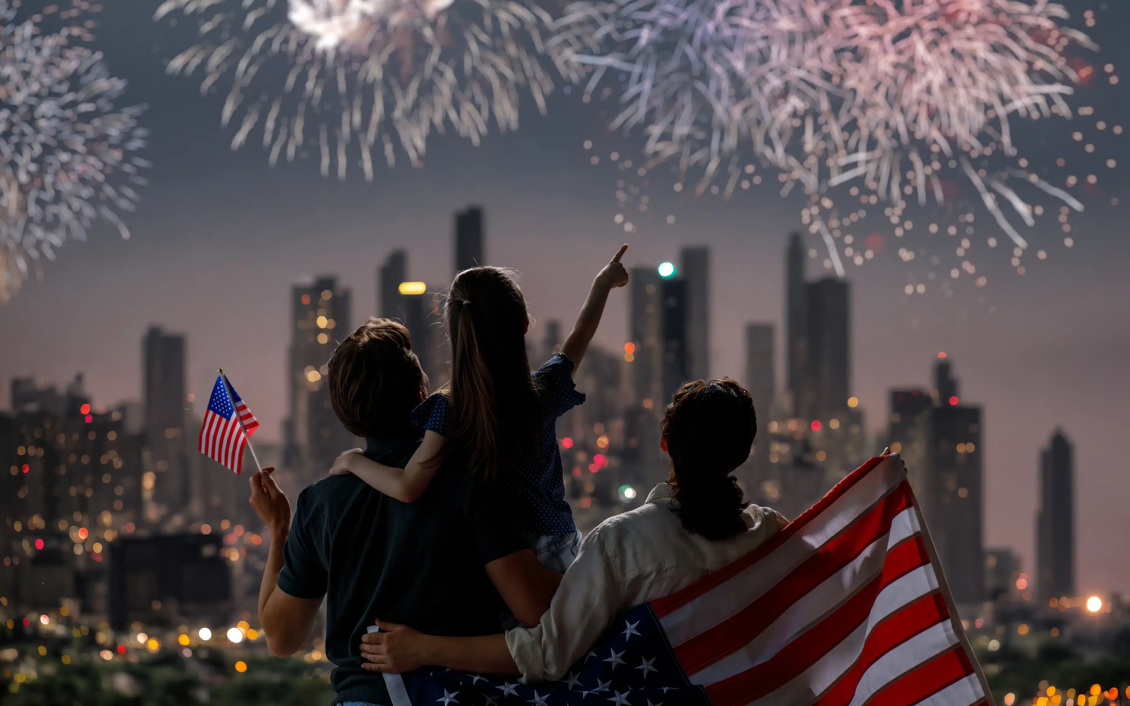 A patriotic American family celebrate Independence Day.