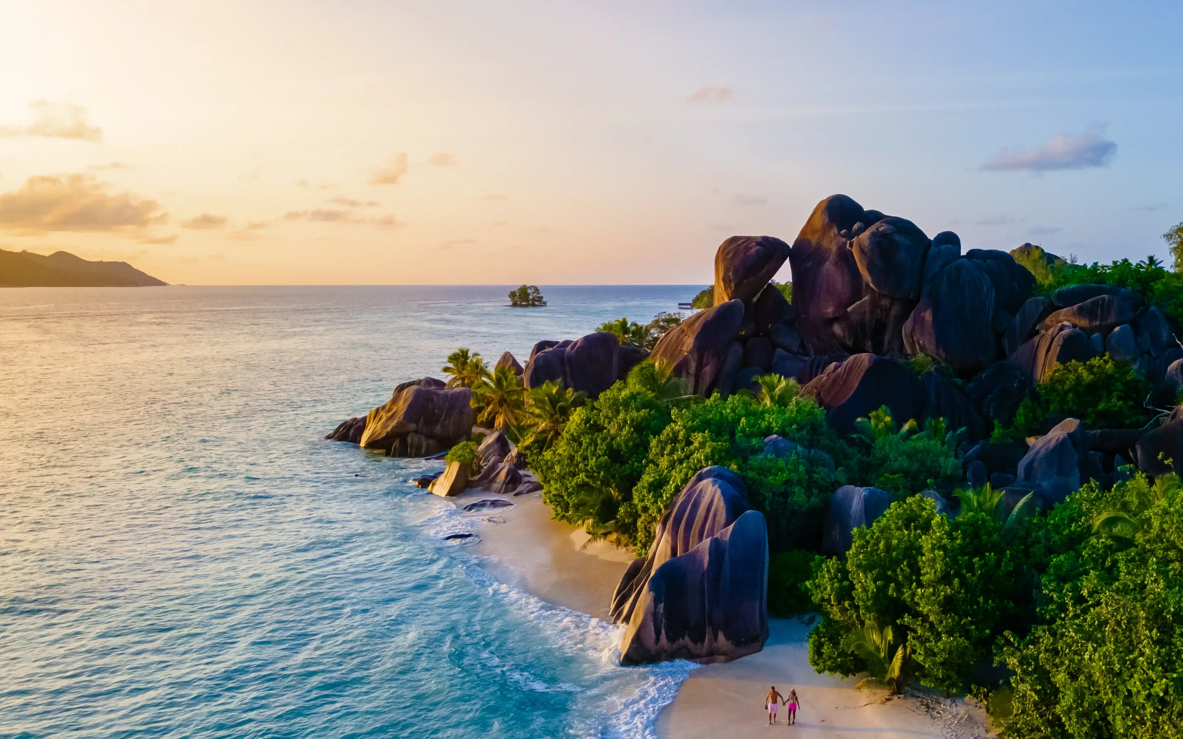 La Digue Seychelles, a tropical beach at sunset.
