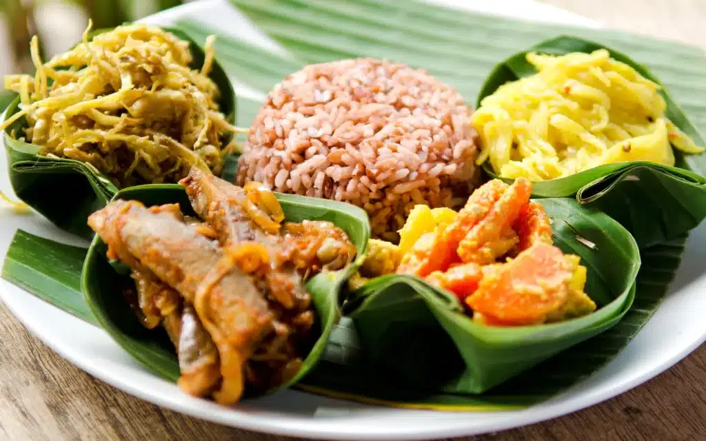 Indonesian food in bali, several curries and rice.