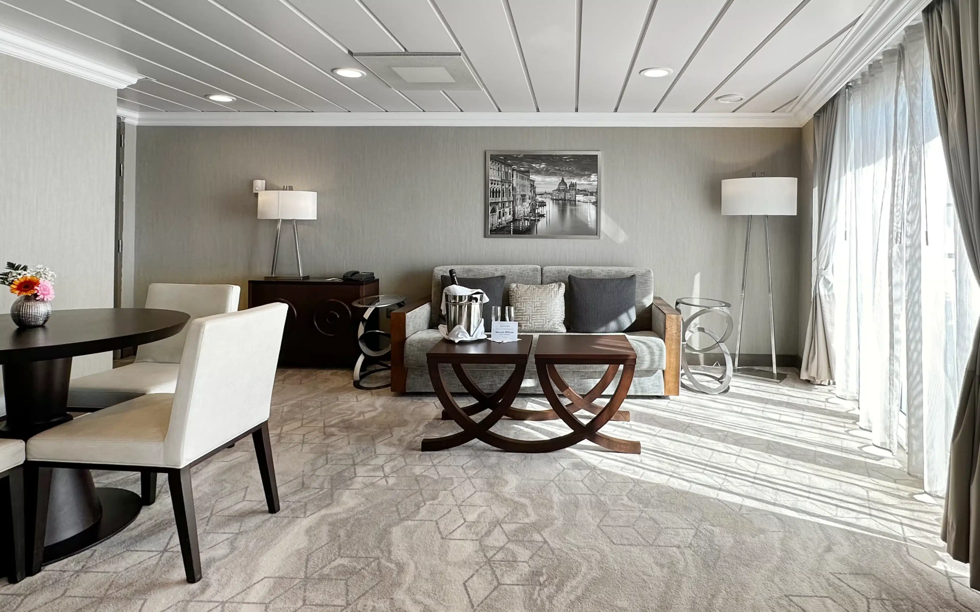 The living room in an Azamara Pursuit Ocean Suite.