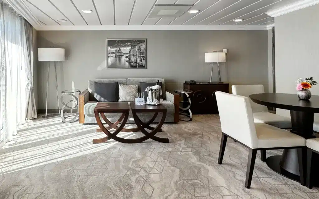 The living room in an Azamara Pursuit Ocean Suite.