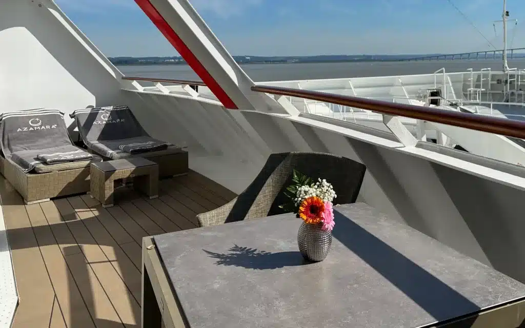 The veranda of a forward-facing Ocean Suite onboard Azamara Pursuit.