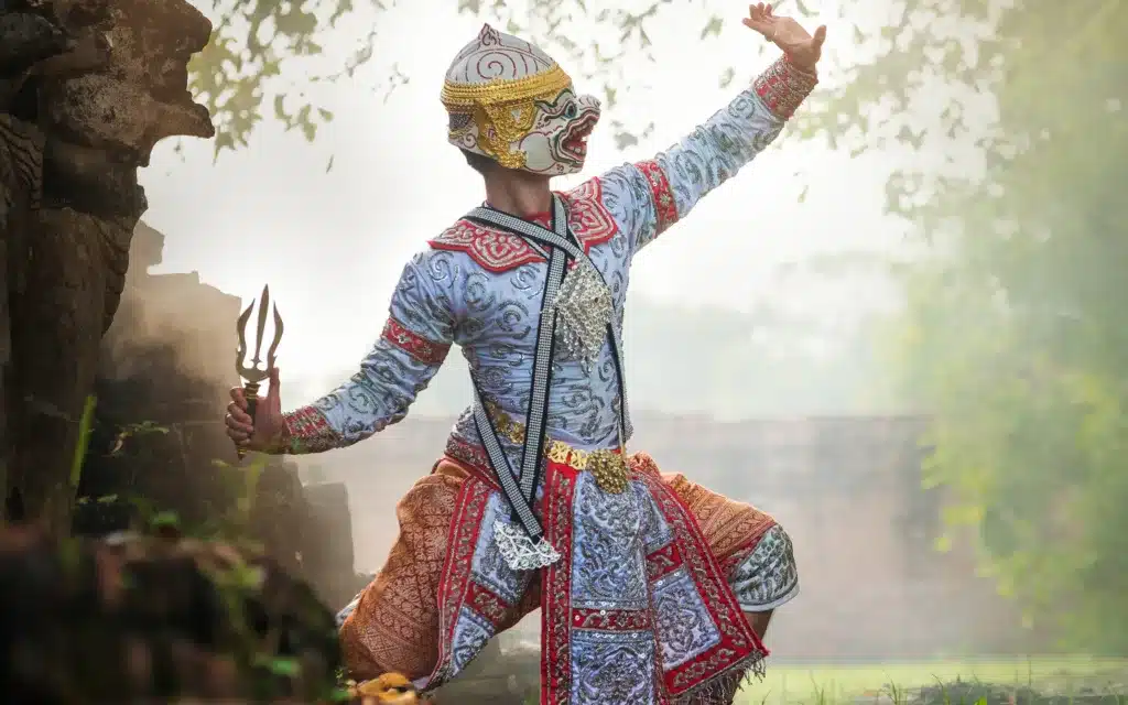 Male Thai dancer in monkey mask.