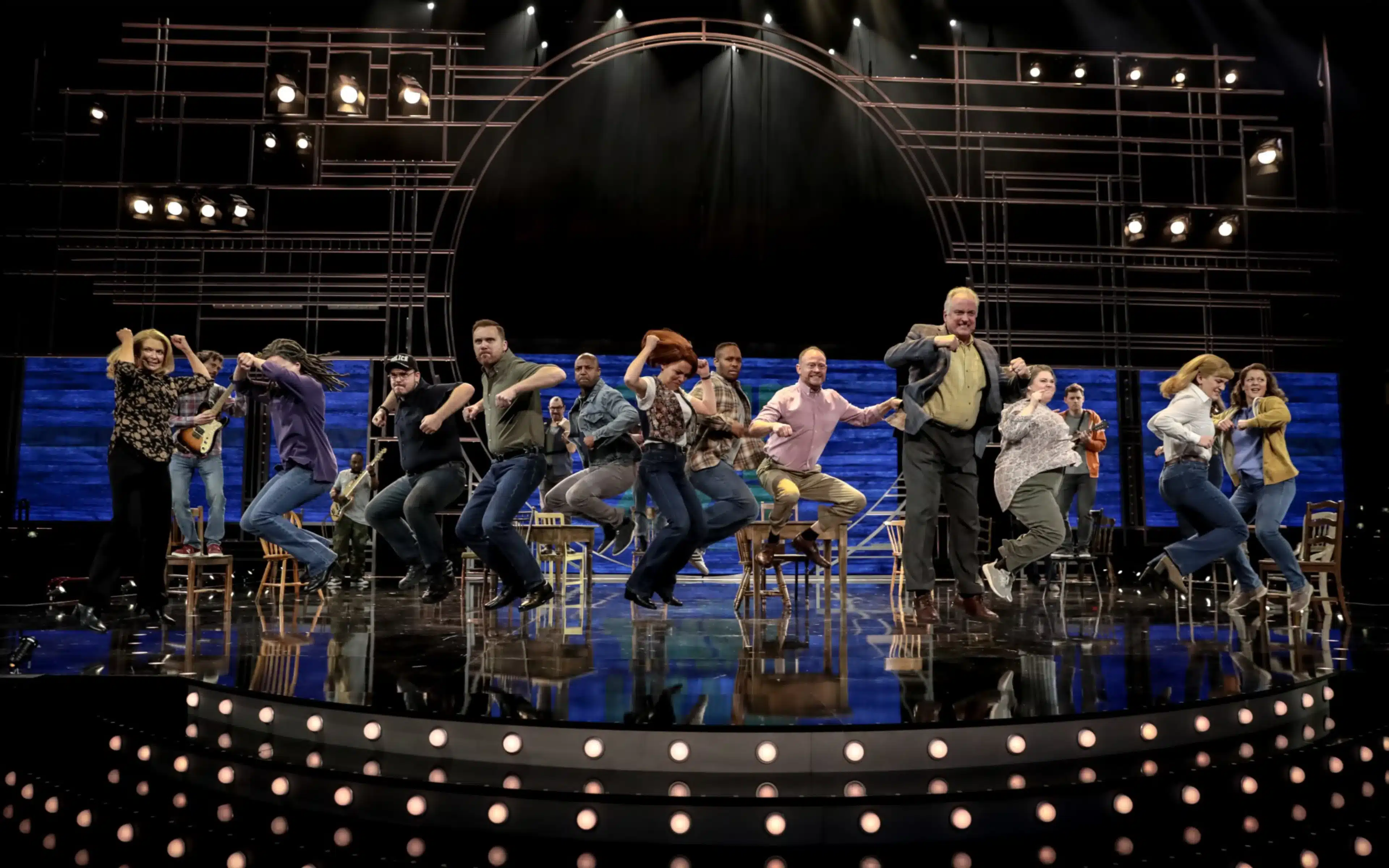 Cast members perform in "Come from Away" on board Cunard's Queen Elizabeth.