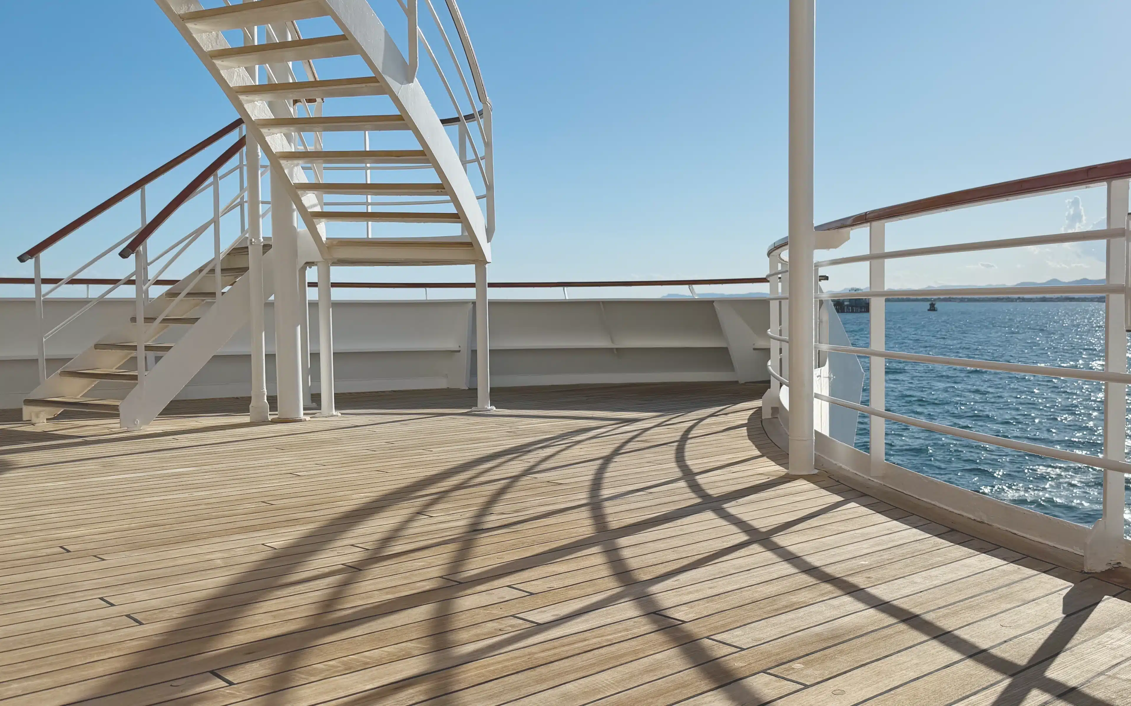 A open deck on board Crystal Symphony with a view to the ocean.