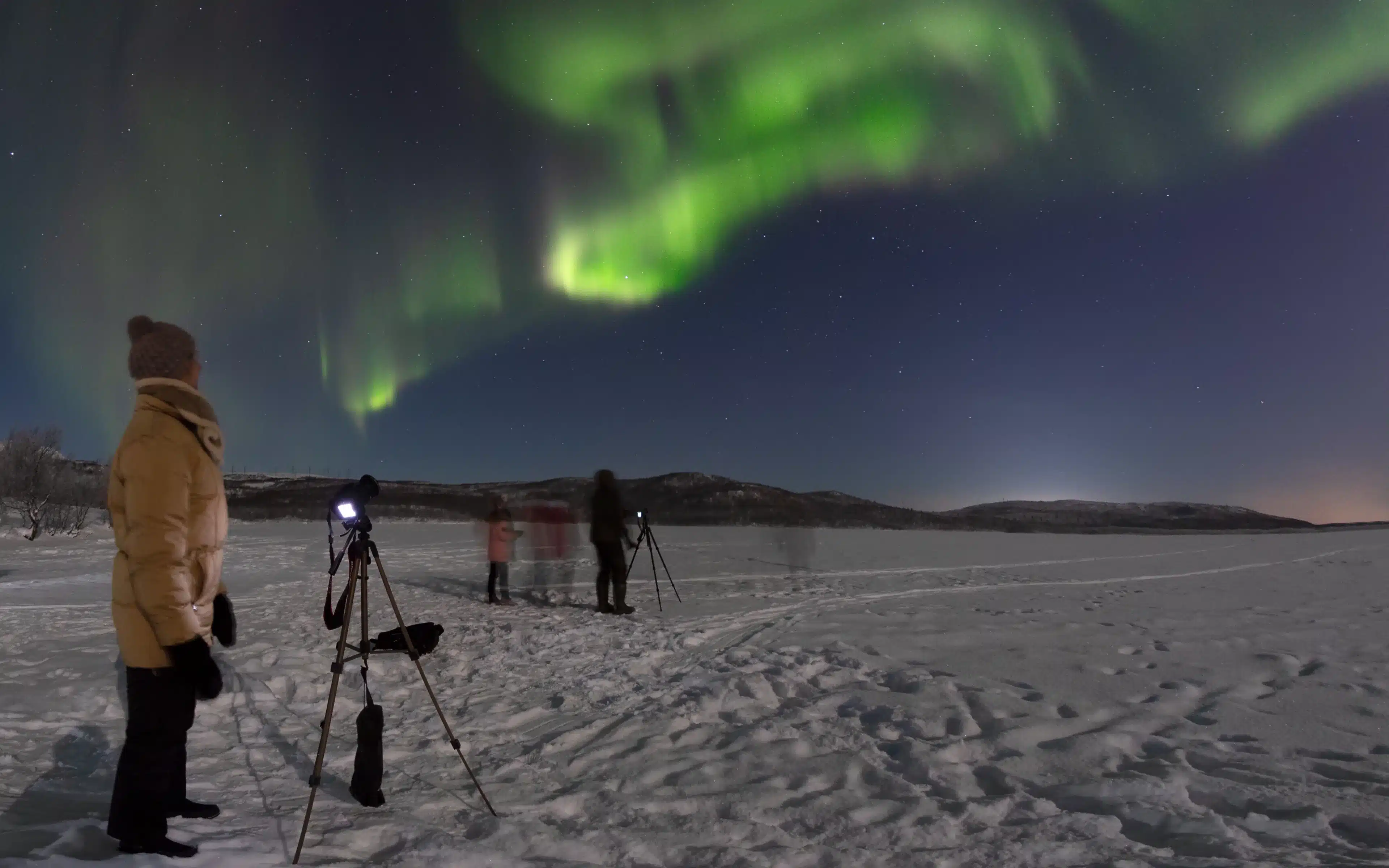 Photographers witness the Aurora Borealis.