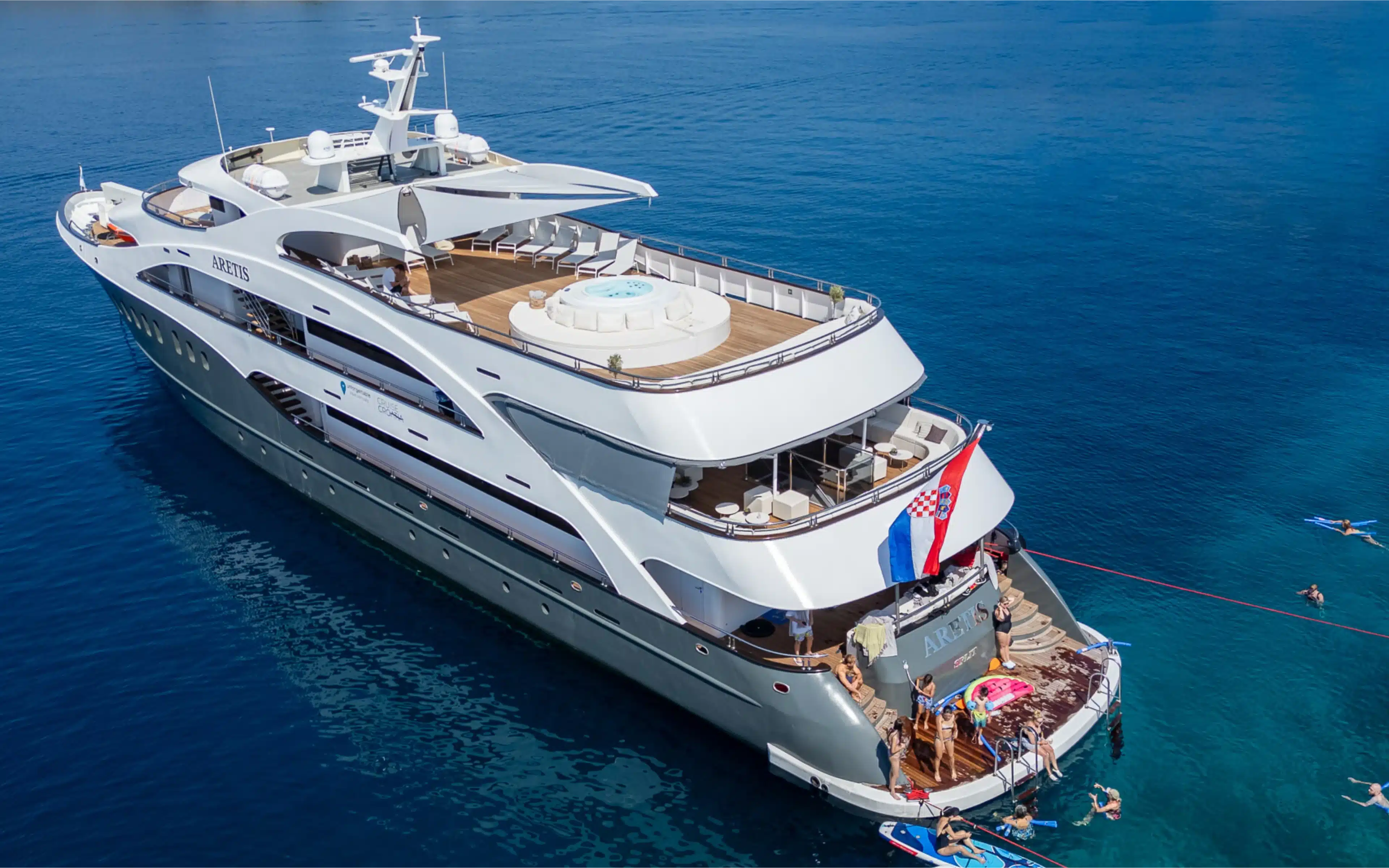 Unforgettable Croatia, Aretis ship amkes a swim-stop.