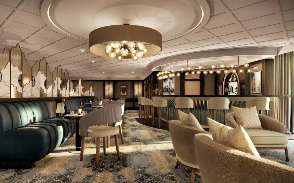 The Atlas Bar with banquette seating, bar, and arm chairs.