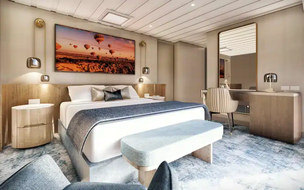 A Panorama Suite bedroom with ornate bedside lamps.