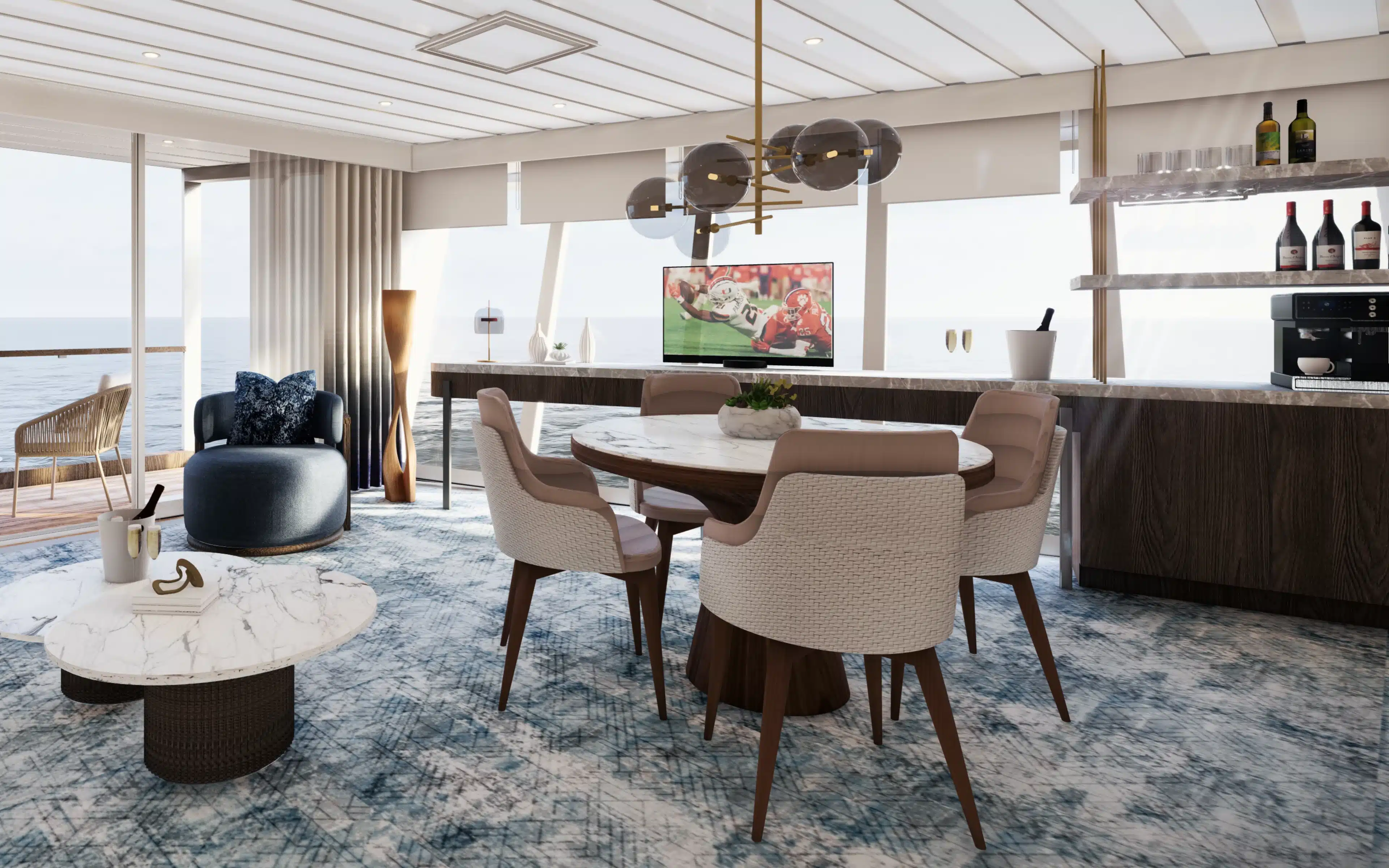 A Panorama Suite living room with dining table, panoramic views and coffee machine.