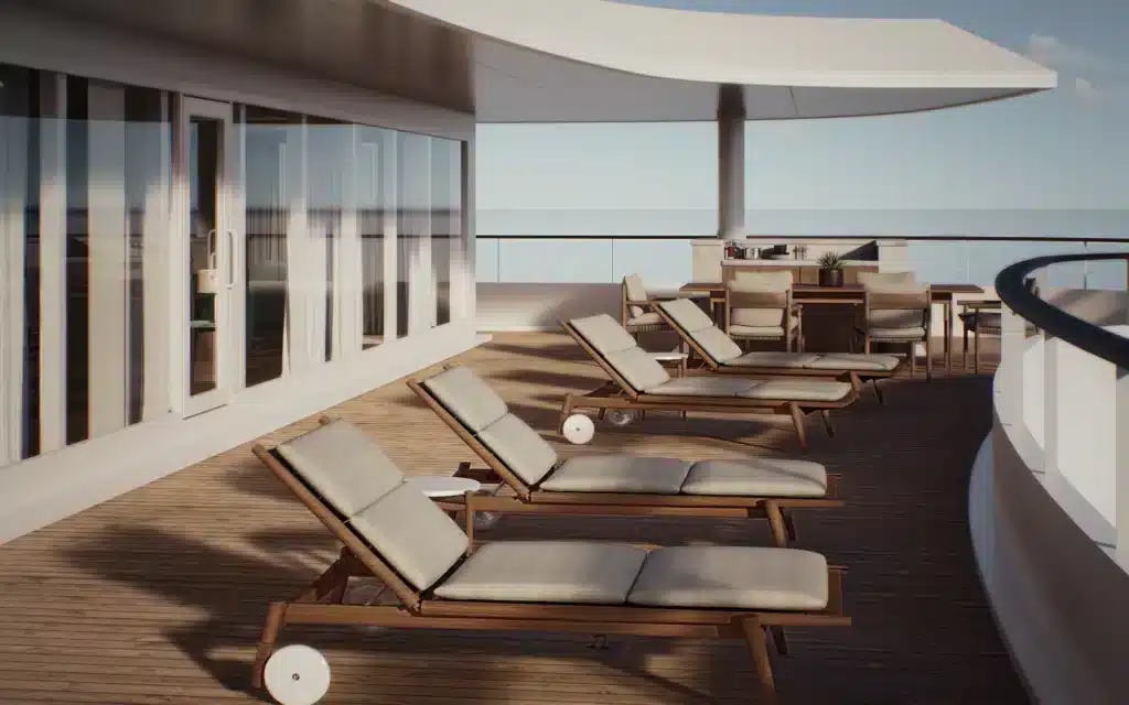 The Crystal Grace Owner’s Suite veranda decked out with sun loungers.