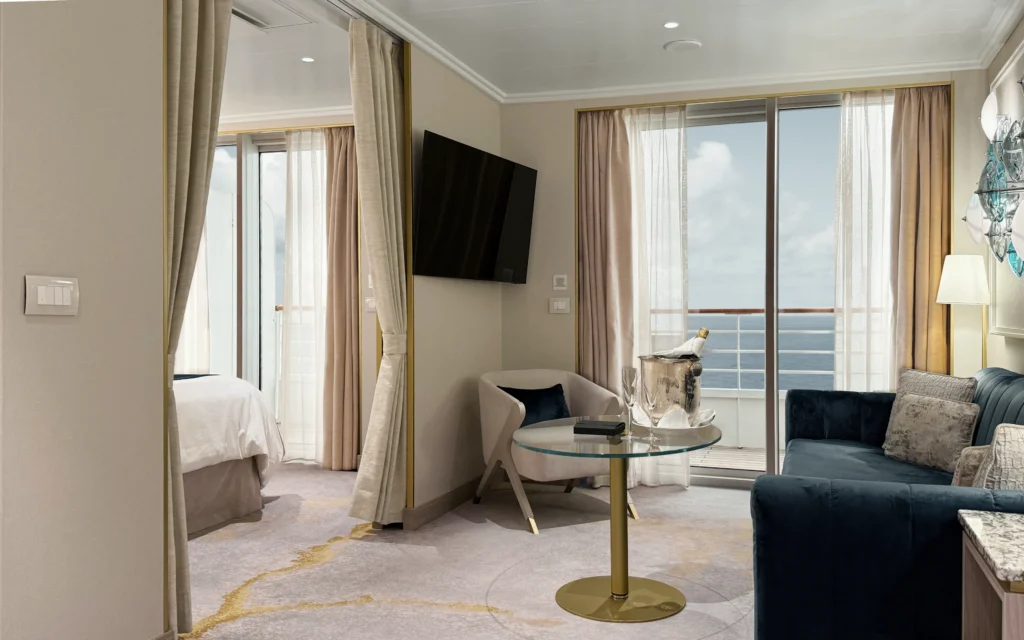 View from the living room into the bedroom in a Sapphire Veranda Suite.