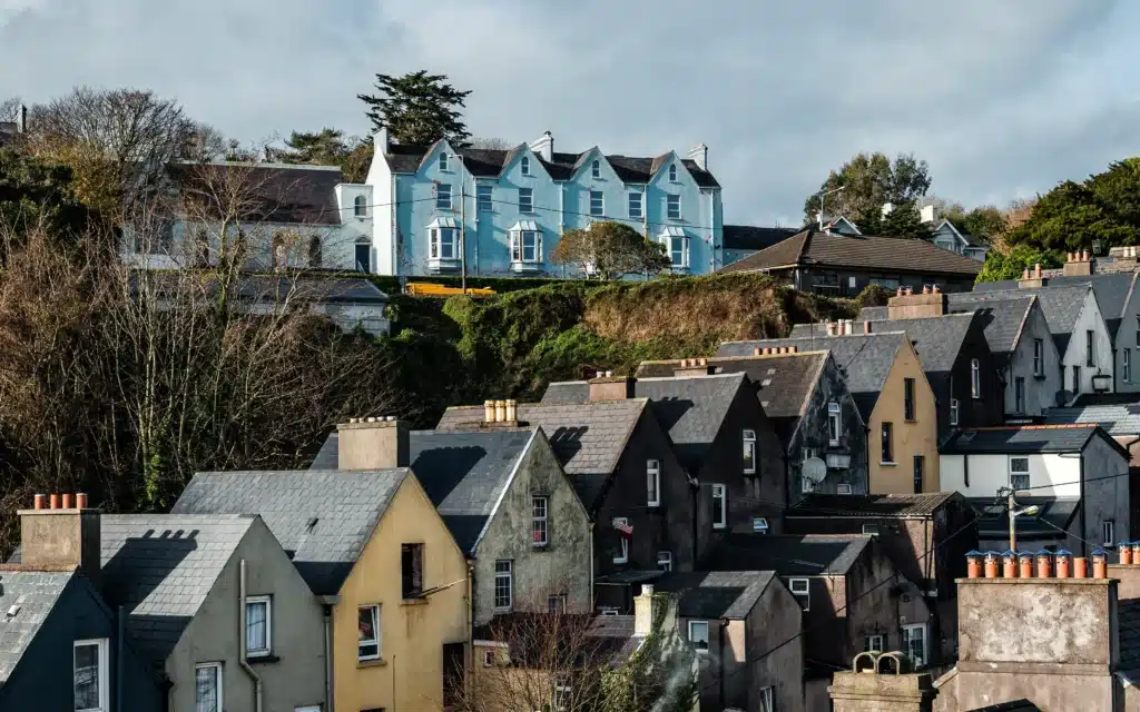 Row colored houses on a hillside in Cobh in the County of Cork in Ireland. 