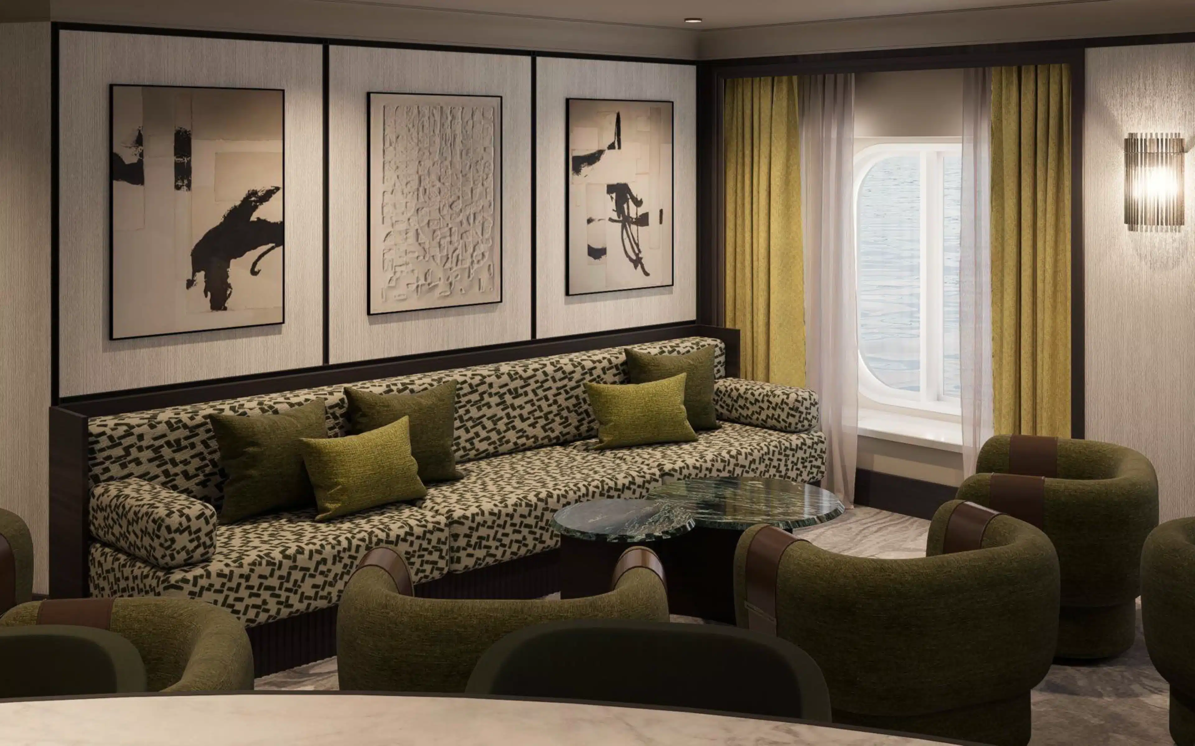 Crystal Cove lounge aboard Crystal Serenity following the 2026 drydock refit, featuring a long sofa upholstered in an olive and cream geometric pattern with solid olive velvet scatter cushions, two rounded deep green armchairs, a circular glass-topped coffee table, three framed black-and-white abstract artworks on a textured wall above, and olive and gold drape curtains beside a porthole window with a wall sconce