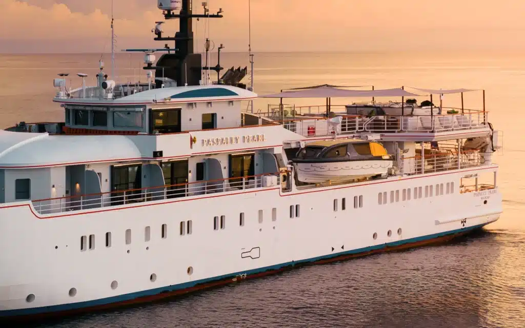 Paspaley Pearl expedition ship at sunset on calm water