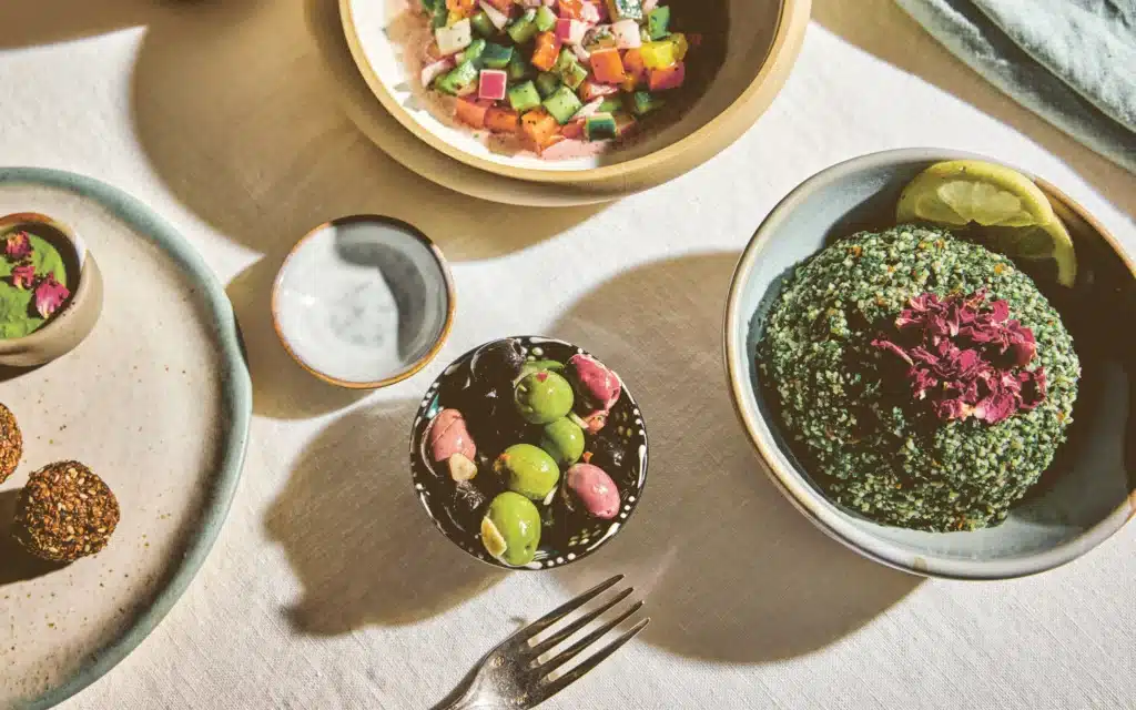 Mediterranean mezze spread with falafel, hummus, olives and herbed cheese